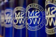 Row of bottles with SMWC logo
